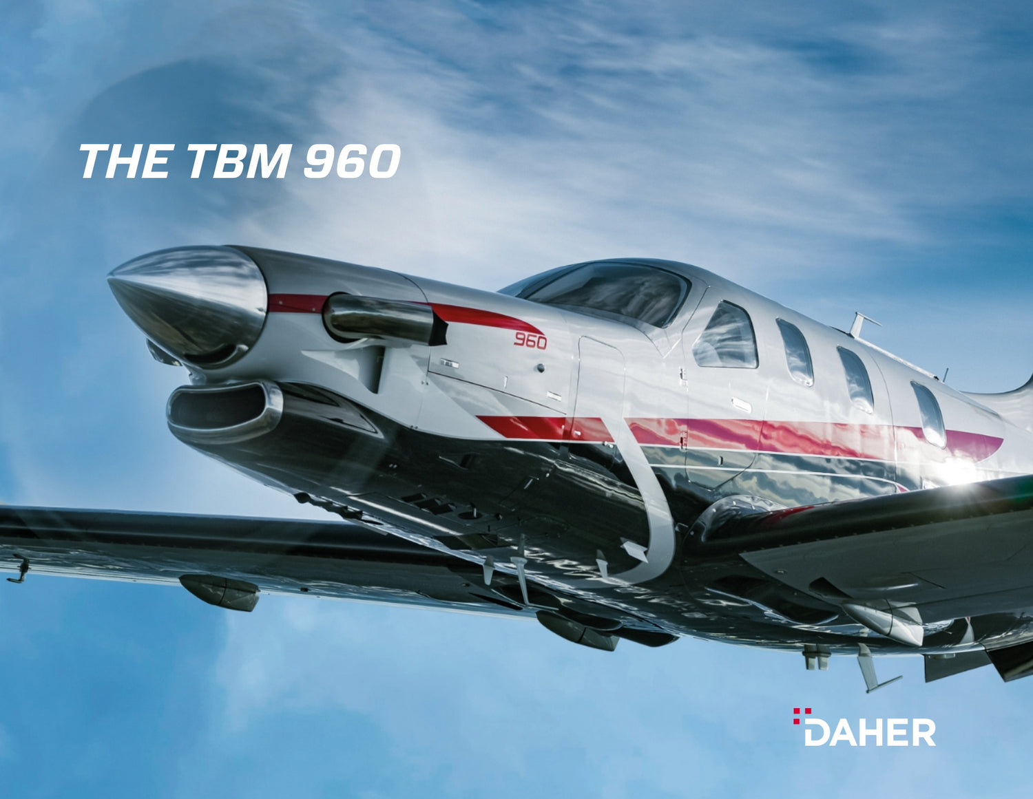 The tbm 550 is flying in the sky.